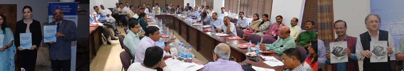 A roundtable discussion around a long meeting table